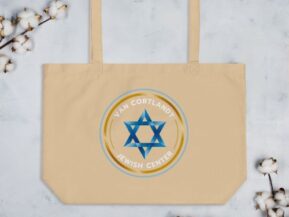 Van Cortlandt Jewish Center logo on beige tote bag with cotton decor