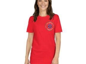 Woman wearing a red t-shirt with the Van Cortlandt Jewish Center logo.