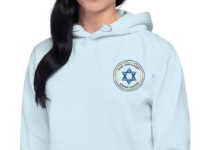 Woman wearing Van Cortlandt Jewish Center hoodie with Star of David logo
